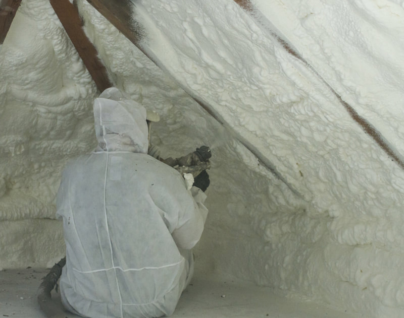 contractor installing roof spray foam insulation Boise, Idaho